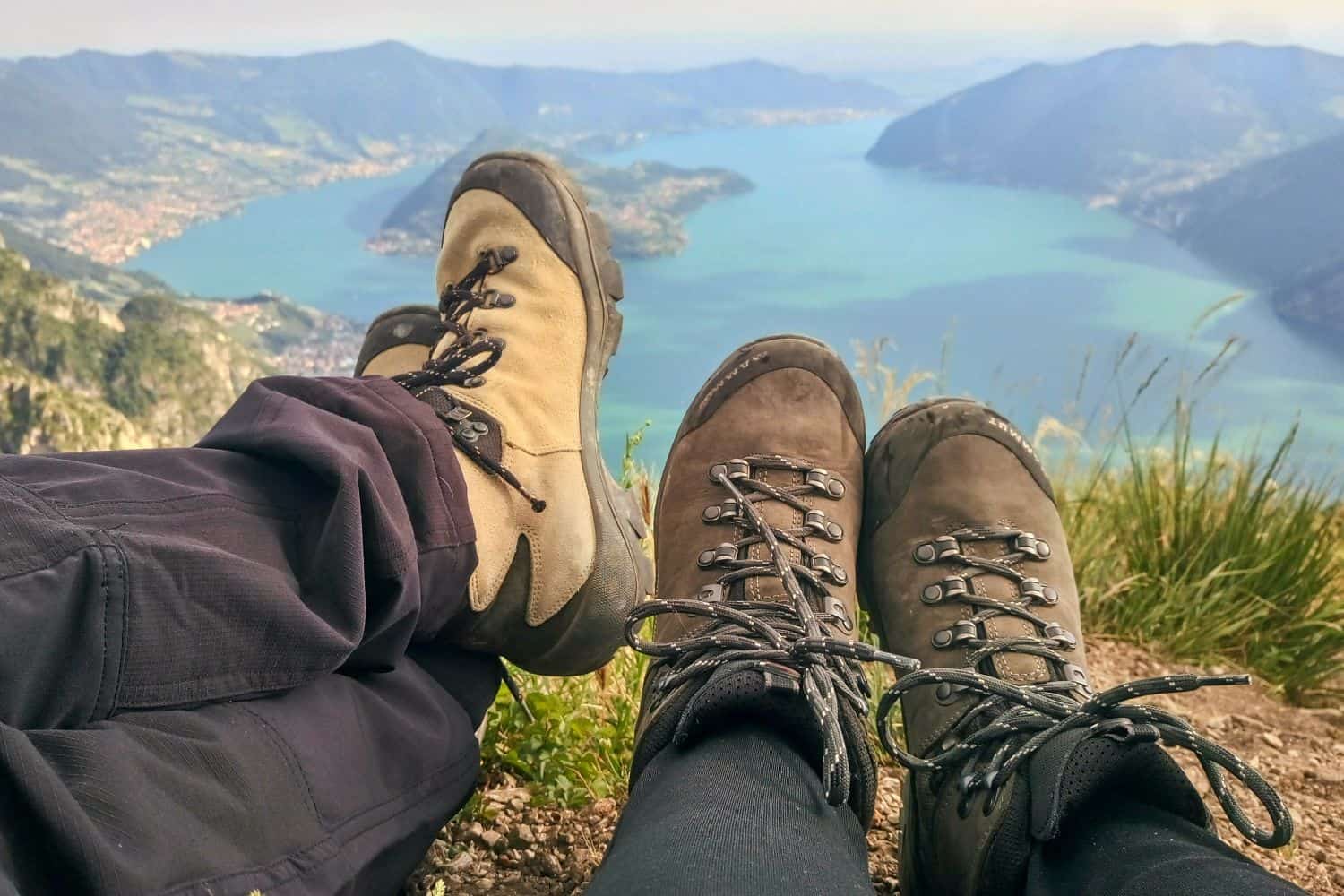 a picture of hiking boots after hiking trenta passi near sarnico lago d iseo italy with the lake and monte isola island in the background